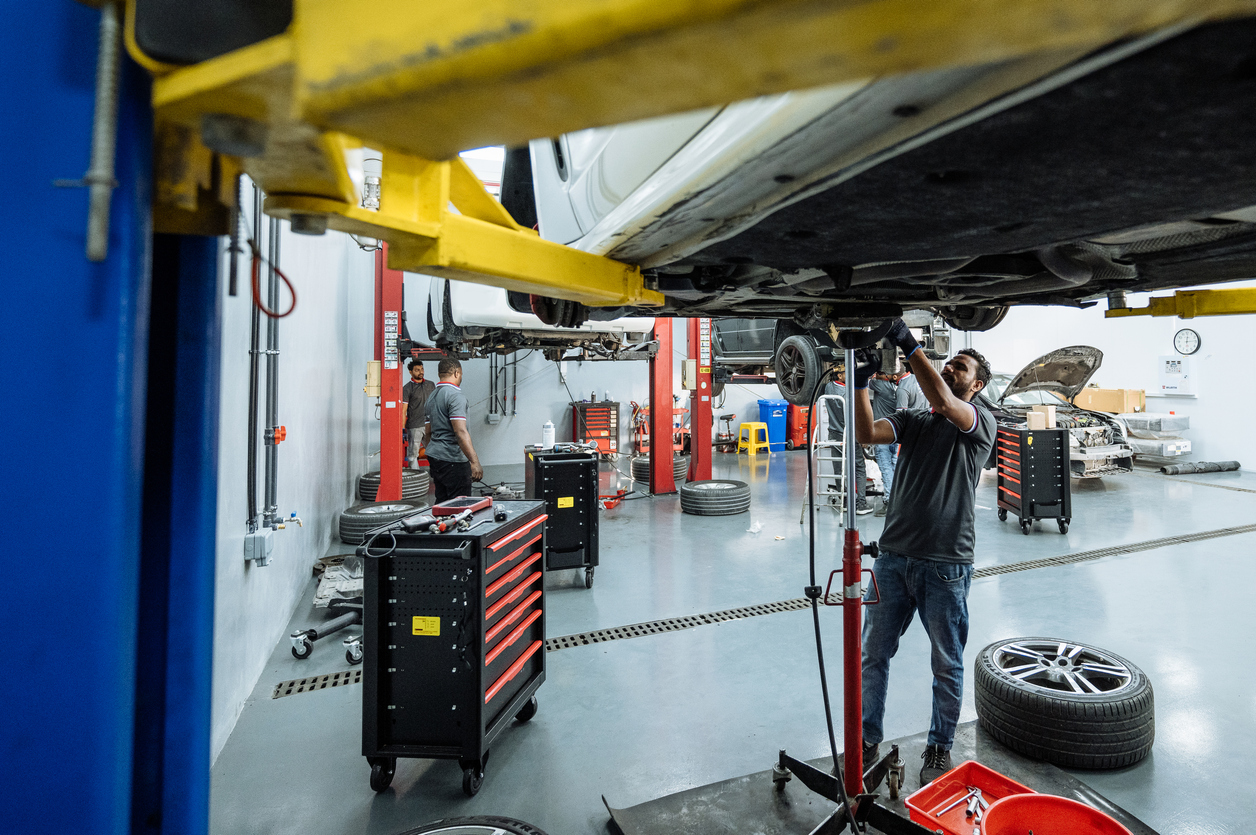 Auto repair shop with multiple vehicles scheduled for service