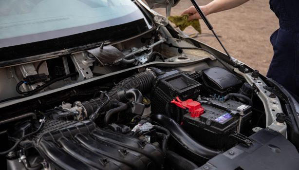 Auto repair technician completing approved repair work to capture earned revenue